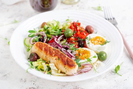 Photo for Breakfast homemade chicken sausage with boiled egg and fresh salad. Keto, ketogenic breakfast. Trendy breakfast. - Royalty Free Image