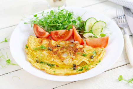 Photo for Healthy breakfast.Quesadilla with omelette, bacon  and tomatoes salad. Keto, ketogenic lunch. - Royalty Free Image