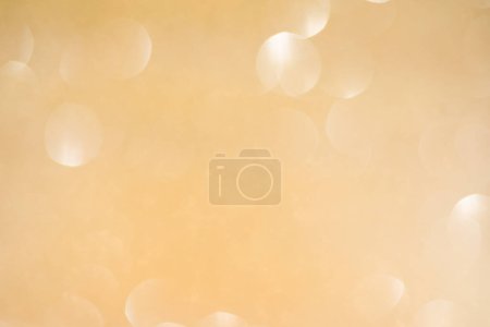 Foto de Fondo brillante, textura brillante llena de reflejos y oropel en color oro. - Imagen libre de derechos