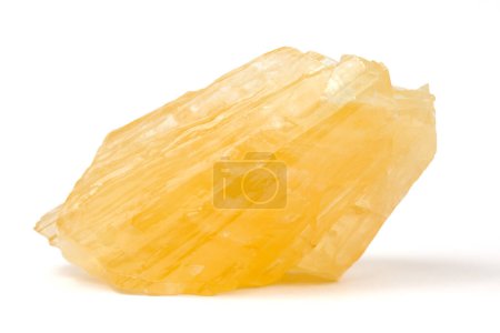 Foto de Una pepita cruda de calcita amarilla de Polonia. Un mineral del grupo carbonato. - Imagen libre de derechos