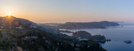 Aerial sunrise view of the bay of Palaiokastritsa on the island of Corfu, Greece