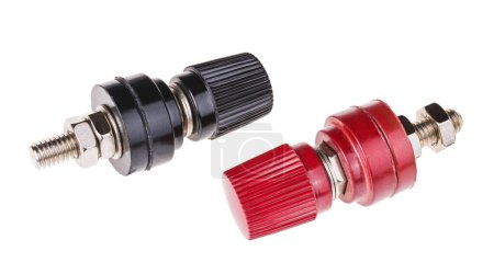 Photo for Red and black binding post connector with screw threaded terminal isolated on a white background. Close-up of electrical fasteners for bare wire clamping on electronic test equipment or other devices. - Royalty Free Image