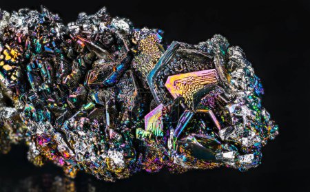 Photo for Closeup of beautiful colorful silicon carbide crystals on a black background. Iridescent synthetic carborundum detail. Use as abrasive, semiconductor or diamond gem imitation. Rare moissanite mineral. - Royalty Free Image