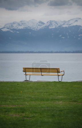 Photo for Yellow bench over Lake Constance in Switzerland - Royalty Free Image