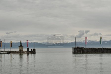 Photo for Airship flying over the harbor in Romanshorn, Switzerland - Royalty Free Image