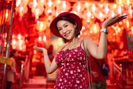 Photo for Happy thai woman at temple in yaowarat china town bangkok during chinese new year - Royalty Free Image