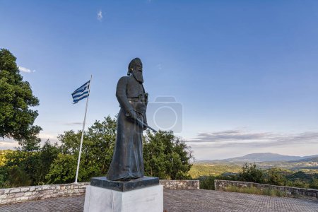 Photo for Statue of Papaflessas at the historical old village Maniaki in Messenia, Greece. Papaflessas was a Greek patriot, priest, and government official. - Royalty Free Image