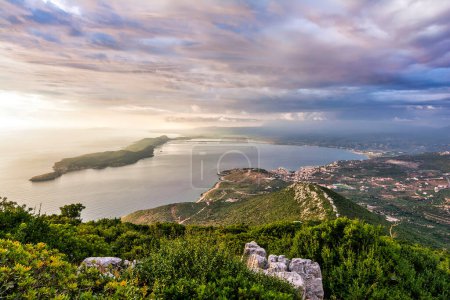 Photo for Top view of the iconic and picturesque town of Pylos and of the nearby island Sfaktirias, Messinia prefecture, Peloponnese, Greece. - Royalty Free Image