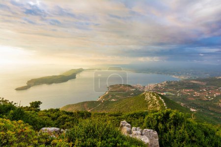 Photo for Top view of the iconic and picturesque town of Pylos and of the nearby island Sfaktirias, Messinia prefecture, Peloponnese, Greece. - Royalty Free Image
