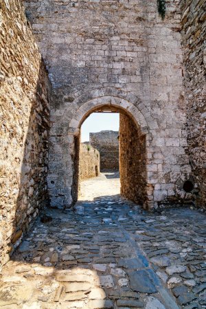 Photo for The main arched entrance gate of Methoni Castle. The castle is a medieval fortification in the port town of Methoni, Messinia Peloponnese, Greece. - Royalty Free Image