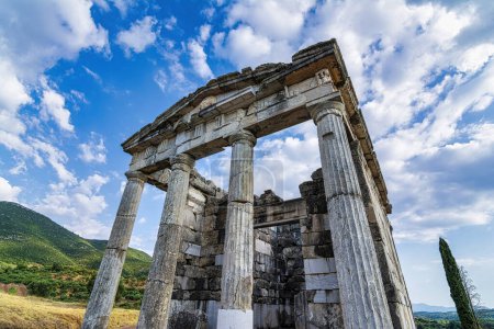 Photo for Ancient Messene, the mausoleum of the Saithidae family. The doric temple-like building with four columns on the front supported by a high podium functioned as a mausoleum for the burials of the elite family of the Saithidae, from the 1st to the 3rd c - Royalty Free Image