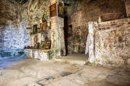 Athens, Greece - October 22, 2023: Inside the monastery enclosed by Davelis cave in Penteli, a mountain to the north of Athens, Greece.