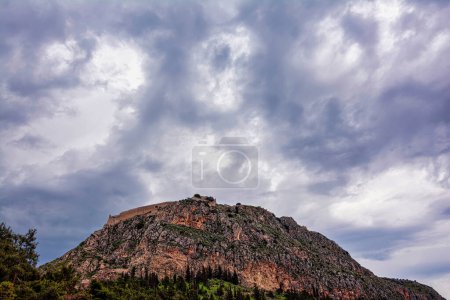 The historical Palamidi fortress against an overcast sky, in Nafplio city, Argolis, Greece. The fortress was built by the Venetians.