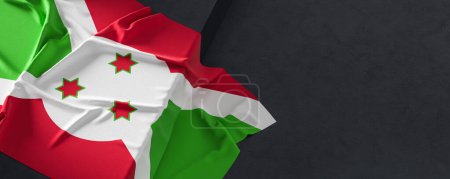 Flag of Burundi. Fabric textured Burundi flag isolated on dark background. 3D illustration