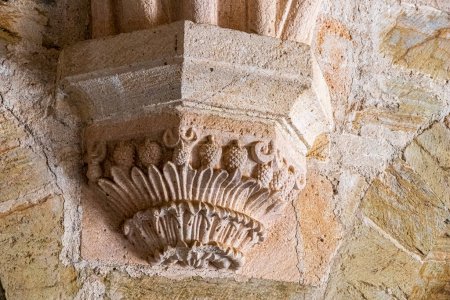 Photo for Romanesque corbels in the medieval chapterhouse of the Monastery of Saint Mary of Carracedo, Spain - Royalty Free Image