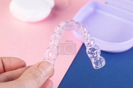 Téléchargez les photos : Orthodontic treatment, invisible braces, new orthodontic technology, occlusal splint - en image libre de droit