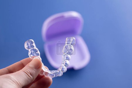 Foto de Orthodontic treatment, invisible braces, new orthodontic technology, occlusal splint - Imagen libre de derechos