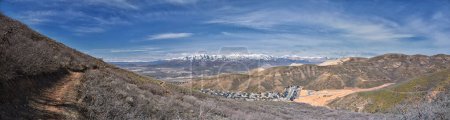 Photo for Salt Lake and Utah County Valley views from Sensei Lolo loop trail snowy mountain valley in Lone Peak Wilderness Wasatch Rocky Mountains, Utah. USA. - Royalty Free Image