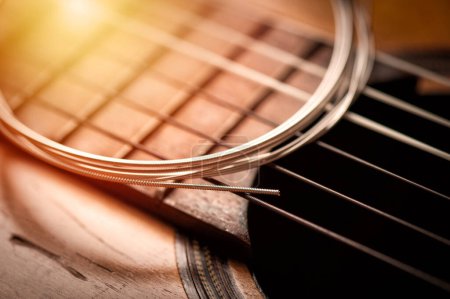 Photo for Abstract new nylon core guitar strings. Restring classical guitar string concept. - Royalty Free Image