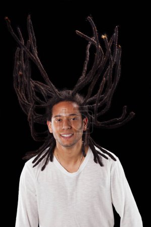 happy rastafari man with flying hair