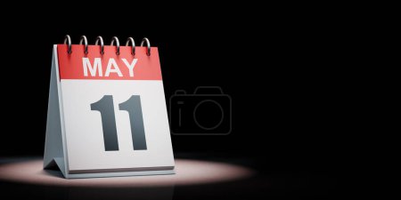 Rojo y blanco 11 de mayo Calendario de escritorio iluminado sobre fondo negro con espacio de copia Ilustración 3D