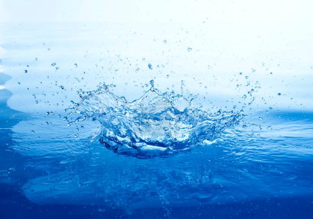 Photo for Blue water splash on the blue background - Royalty Free Image