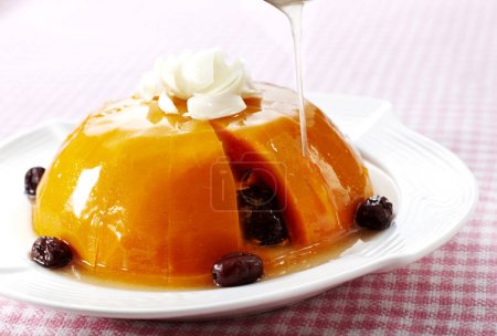 delicious pumpkin pudding with caramel-stock-photo