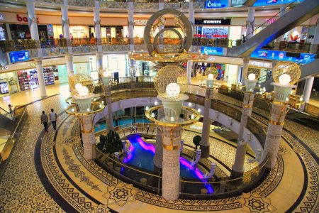 Téléchargez les photos : Ashgabat, Turkmenistan. May 02, 2021: New shopping mall  "Berkarar".  Modern retail shopping mall with upscale stores in an Ashgabat city. - en image libre de droit