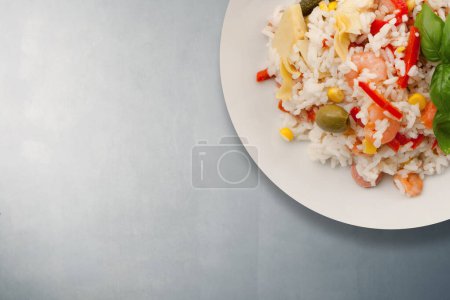 Photo for Plate Of Rice Salad On background - Royalty Free Image