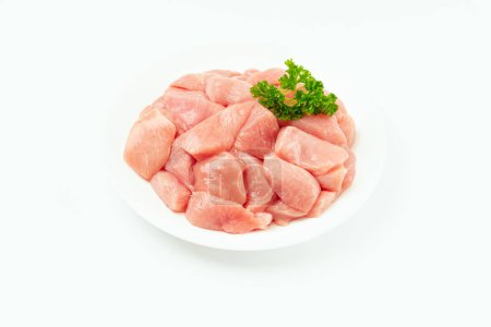 Photo for Fresh frozen pieces of turkey meat on a white background.Raw chicken.Frozen chicken fillet.Ogranic food and healthy eating.frozen turkey or poultry meat.Chicken Skewers breast fillet meat - Royalty Free Image