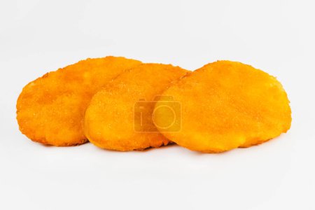 Photo for Chicken fillets fried until half cooked, semi-finished product with fresh herbs on a white background. Fast cooking.Fast homemade food.Fast food. Quick cooking at home. Copy space. - Royalty Free Image