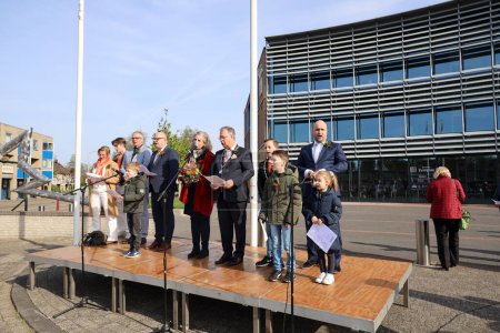 Photo for Netherlands, Zuidplas april 27th - The mayor and aldermen accept the congratulations for the birthday king during King's Day in Nieuwerkerk aan den IJssel during aubade in the Netherlands - Royalty Free Image