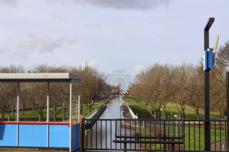 Photo for Platforms and railroad tracks at train station Nieuwerkerk aan den IJssel in the Netherlands - Royalty Free Image