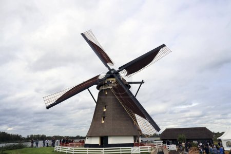 Photo for Official commissioning of Eendrachtmolen windmill after extensive renovation in Zevenhuizen in the Netherlands - Royalty Free Image
