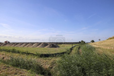Photo for Pastures with farms and roads in the future Fifth Village of the Zuidplaspolder of the municipality of Zuidplas in the Netherlands - Royalty Free Image