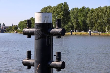 bollard for large shipping in Gouwe Canal in the city of Gouda in the Netherlands