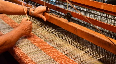 Ardara,Ireland - september 15 2022 : a tweed textile worker