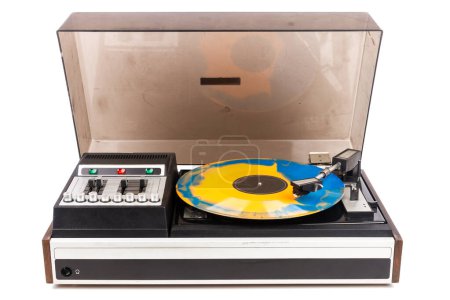 Vintage turntable record player with blue and orange vinyl isolated on white background.