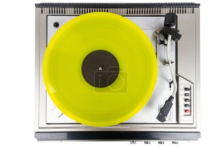 Vintage turntable record player with yellow vinyl isolated on white background.