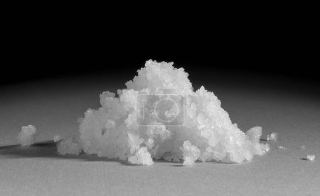 Photo for Sea salt flakes. Sea salt is produced by evaporating seawater. - Royalty Free Image
