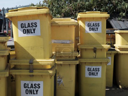 Photo for Glass recycling bins at waste disposal facility. - Royalty Free Image