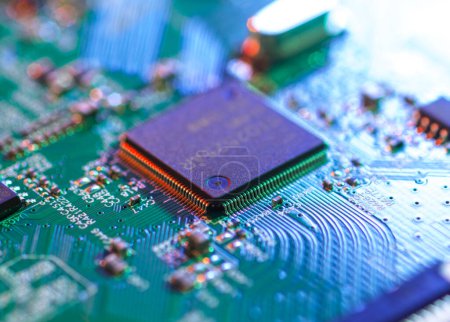 Photo for Close up of an electronic circuit board showing microchips and components. - Royalty Free Image