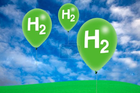 Foto de Ilustración conceptual que representa la energía limpia. La imagen muestra el símbolo químico del hidrógeno (H2) en globos en las nubes. - Imagen libre de derechos