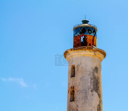 lighthouse in Klein Curacao old construction and blue sky