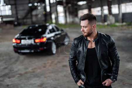 Photo for Stylish man in biker black jacket and sunglasses. Brutal successful man in leather jacket. - Royalty Free Image