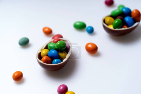 A Colorful Bowl of Sweet Treats. A bowl filled with lots of candy on top of a table