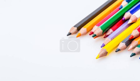 Photo for A Spectrum of Vibrant Colors: A Row of Colored Pencils on a White Background. A row of colored pencils on a white background - Royalty Free Image