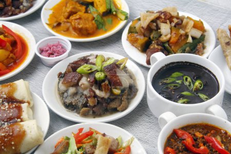 Photo of freshly cooked assorted Filipino dishes.