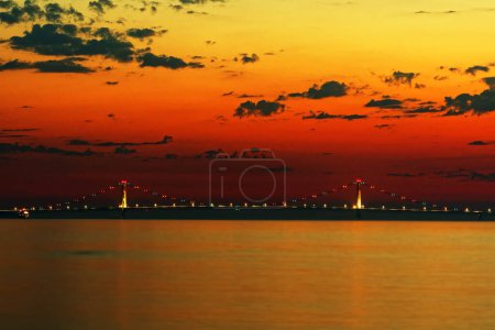 Photo for Mackinac Bridge after sunset as veiwed from Mackinac Island, Michigan. - Royalty Free Image