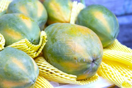 Photo for Papaya for sale at the market, Vietnam fruits, sweet and nutritious fruit - Royalty Free Image
